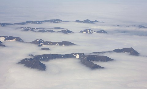 Only the upper parts of the mountains is above the arctic fog. North Iceland